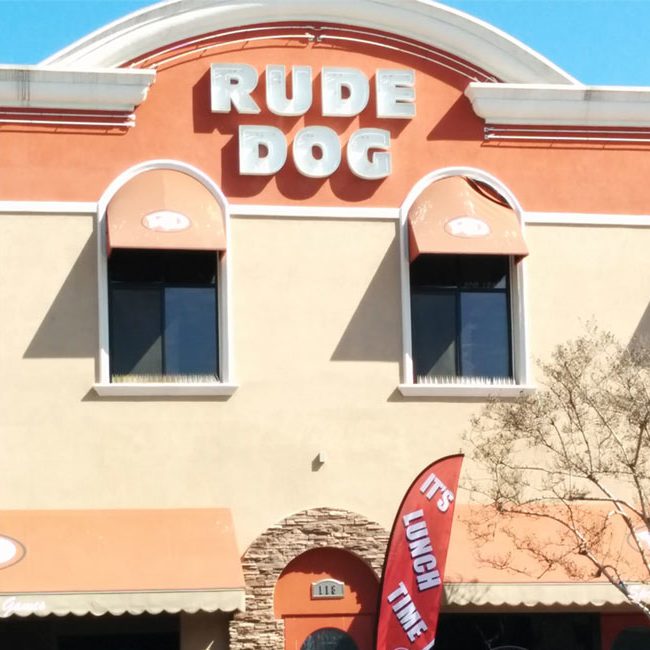 View of the front of Rude Dog Bar & Grill from Citrus Ave in Covina, CA